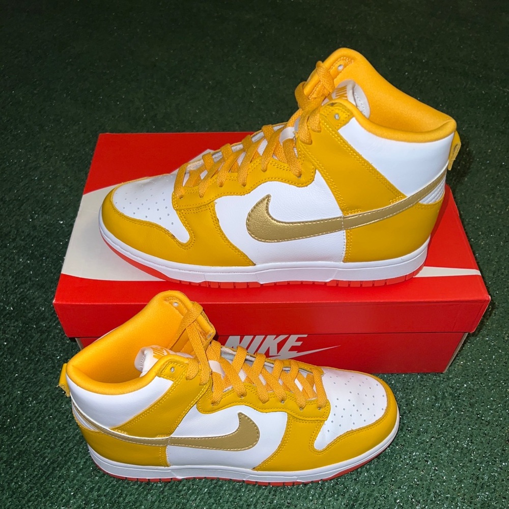 Nike dunk highs “University Gold) W